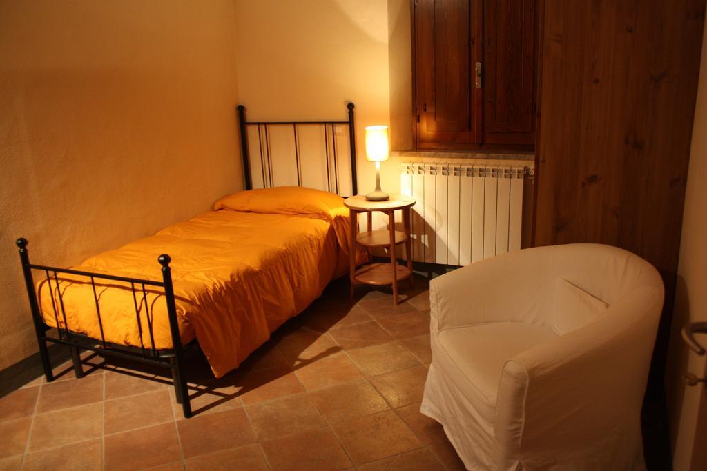 Villa Montarioso Сиена Номер фото